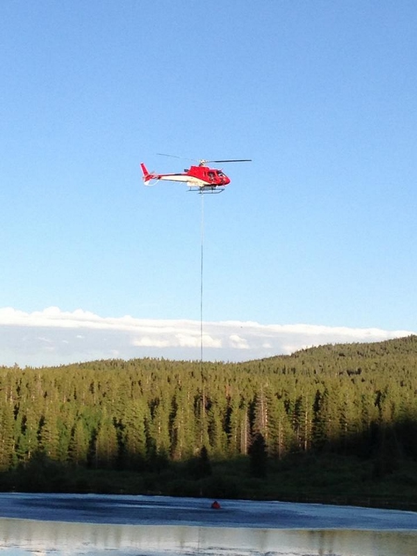 Helicopter fill-up at lake